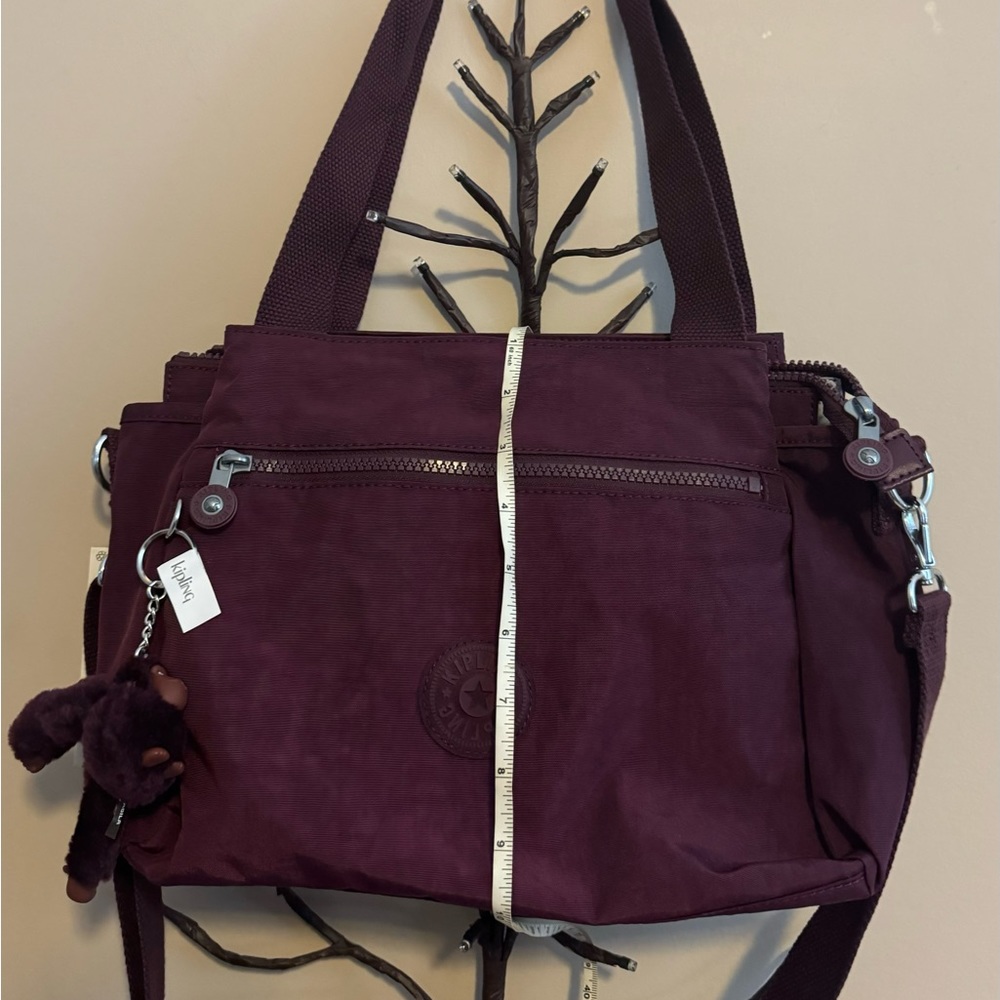 Brand new “Kipling “shoulder bag for women.Color-dark plum tonal.Size-14”x10”💜 - Picture 11 of 11